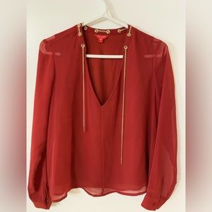 Pretty red flowy Guess blouse.